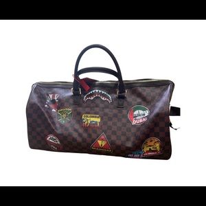 Sprayground duffle and backpack
